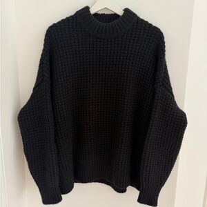 The Row Black Turtleneck Sweater